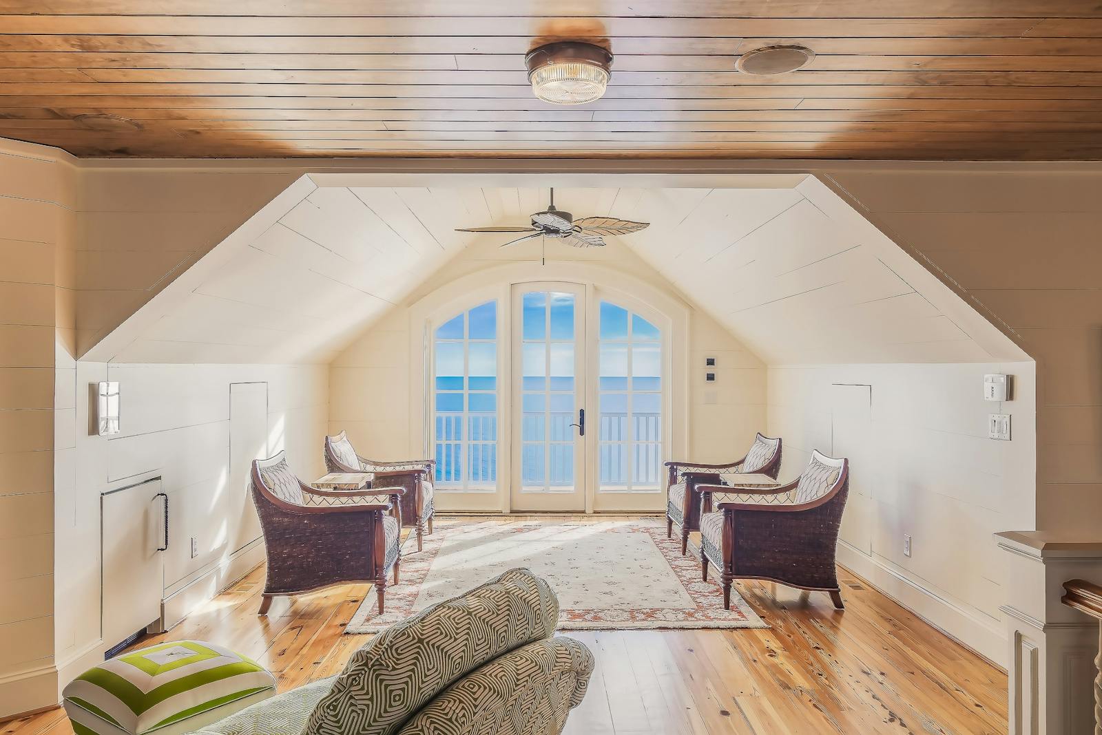 Photo by Pixabay Bright and luxurious loft overlooking the ocean, featuring modern furniture and design.